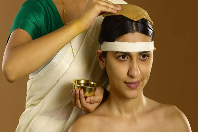 Shiro Pichu Ayurvedic treatment at Dhanwantari Ayurvedic Detox Center in Tiruvannamalai, featuring warm medicated oils applied to the scalp for stress relief, mental clarity, and overall wellness.