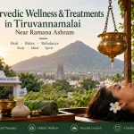 Ayurvedic wellness treatment in Tiruvannamalai near Ramana Ashram with Shirodhara therapy and Arunachala Hill view.